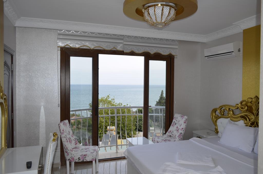 Alev Palace Otel Arsuz Quarto foto